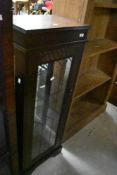 A laminate narrow display cabinet