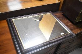 A modern wall mirror in mahogany effect frame, approx. 61 x 51cm