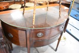 A Regency revival mahogany demi lune sideboard