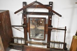 An interesting mirror, constructed from weaving loom parts from woolen mill