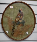 E A Bredee (20th century) oval mixed media composition, perched pheasant, utilising ferns and