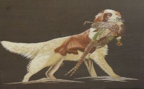 A 20th century silk-work embroidery, gun dog and pheasant, within a moulded and stained oak frame,