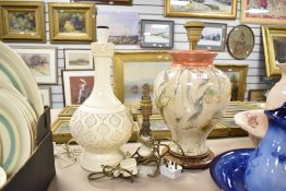 A large faux marble table lamp base with stylised water lily decoration, another similar plaster