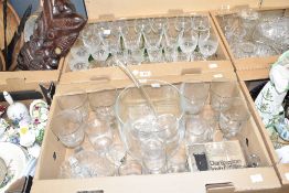 A nice selection of assorted wine and spirit glasses, a cylindrical punch bowl with matching ladle