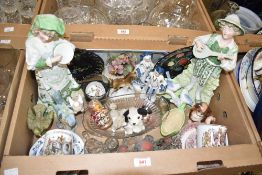 A pair of vintage Gerbruder Heubach style figurines, a wooden Russian nesting figure and a Chinese