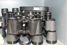 Three pairs of binoculars, comprising Europa, Optus and Greenkat in case