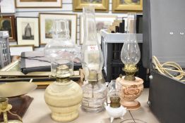 Three vintage oil lamps