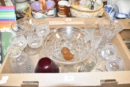 A carton of assorted cut and pressed glass items including a large fluted pedestal cut glass bowl