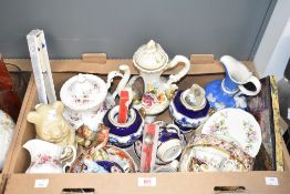 A Royal Albert Lavender Rose teapot and matching milk jug, a novelty Winnie-the-Pooh storage jar and