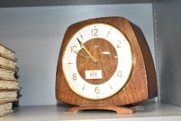 An early 20th century 'Smiths' 8 - day mantel clock, having floating balance wheel and single gong