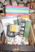 The World Postage Stamp Album part filled and a selection of assorted first day covers and loose