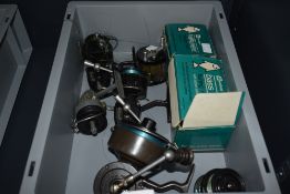 A selection of vintage spinning reels and spare spools Luxor mitchell allcocks etc