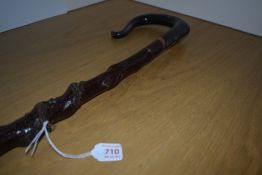 A nice shepherds crook style walking stick with the crook carved from horn or antler