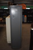 A six gun gun cabinet with internal cartridge storage box two keys present but cartridge box is