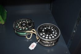 Two 4 & 1/4 inch Shakespeare salmon fly reels one Super Condex the other a Beaulite both well used
