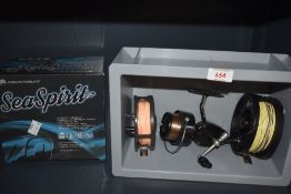 Four fishing reels Sea spirit, Lureflash, airflo and what looks like a Mitchell