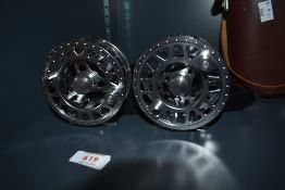 Two alloy 3 and 3/4 inch Fly reels (look to be unused) one marked energy refined fishing