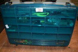 A fishing tackle box containing weights, lures, rigs etc