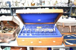 An oversized vintage oak cased canteen of stainless steel cutlery , Kington & Co Liverpool, brass