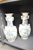 A pair of 18th/19th century Chinese famille vert porcelain vases, having broad flattened rim over