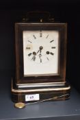 A 19th century French mantel clock, by Martin Baskett, Paris, having a brass carrying handle over