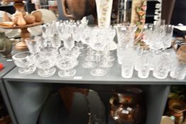 A quantity of cut crystal glasses, to include a pitcher, wine glasses and tumblers ect