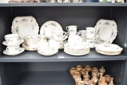 A Shelley 'Chelsea' pattern tea service, having gilt edging and decorated with floral designs on a