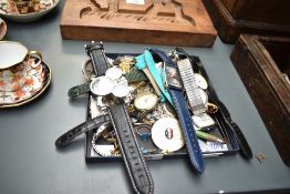 An assortment of costume jewellery, including wristwatches, statement pieces, an enamelled bird