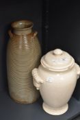 A ceramic vase of lobed form with cover having crackle glaze and scroll handles, h33cm, sold