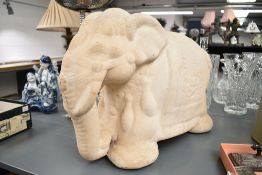 An ornamental sandstone style elephant, height approx. 36cm