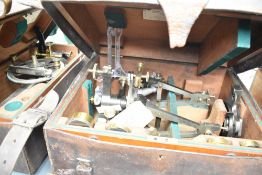 A 1950s Halden & Co Theodolite, in two fitted wooden cases, within leather carrier, serial number