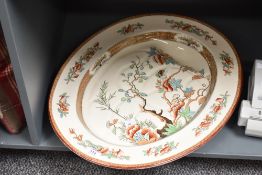 A large Spode meat dish in the Chinese taste decorated with cherry blossom, foliage and butterfly,