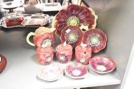 A quantity of Staffordshire Shorter & Sons ceramic dinner/tea wares, hand coloured with poppy