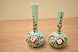 Two Victorian aesthetic period Uranium glass onion form vases, duck egg blue hand decorated with