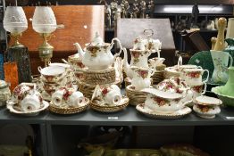 A Royal Albert 'Old Country Rose' dinner service, to include sauce boat, tea pot, coffee pot, cake