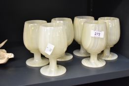 A group of six turned green onyx goblets, 13cm