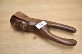 A wooden nutcracker in the form of a monk, L21cm