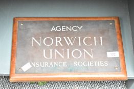 A shop sign reading 'Agency Norwich Union Insurance Societies', w34cm