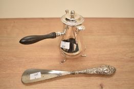 A Georgian style chocolate pot with handle, h13.5cm, sold together with a silver plated shoe
