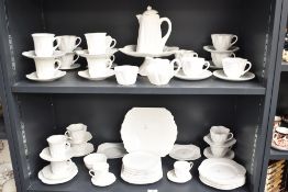 A Shelley fine bone china tea service in the Art Deco style, to include tea pot, milk jug and plates