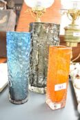 A Whitefriars smoked bark glass vase, h23cm, sold together with a tangerine nailhead vase and a blue