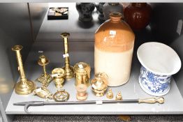 A stone ware flagon, h33cm, sold together with a blue and white pot and brass candlesticks ect, (