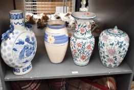 A blue and white moon vase decorated with birds, foliage and dragon style handles, h36cm, sold