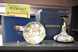 A Moorcroft Pottery 'Otley Chevin' bluebells pattern vase, of flattened onion form tube-lined in the