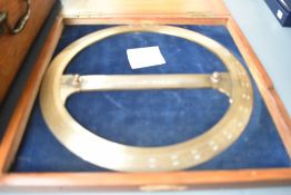 A late 19th or early 20th Century brass protractor, engraved J Casartelli, Manchester, diameter