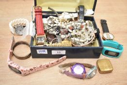 A collection of costume jewellery, including wristwatches, brooches, bangles, cufflinks and beaded