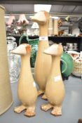 A set of three art pottery ducks, mother duck and ducklings , highest approx. 41cm