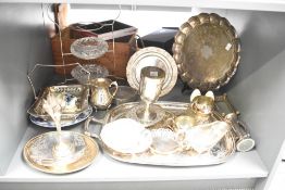 A quantity of silver plated ware, to include tray, sauce boat and a blue and white ceramic plate
