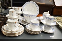 A Shelley fine bone china tea service having painted mark '4075' to base, sold together with another