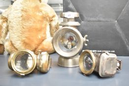 A Joseph Lucas horse cart /vehicle lamp, No F146, h21cm, sold together with two other oil lamps, (